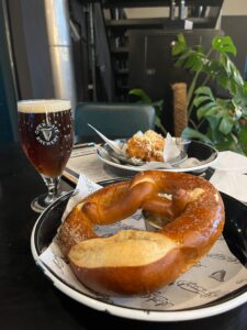 A beer, pretzel and mac & cheese balls at the Open Gate Brewery